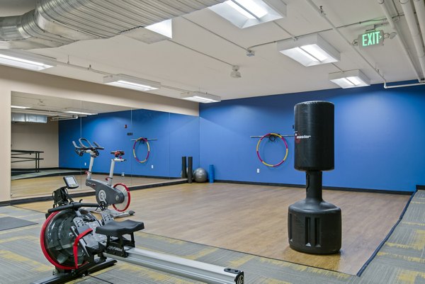 Modern yoga/spin studio featuring state-of-the-art equipment at Novi at Queen Anne Apartments