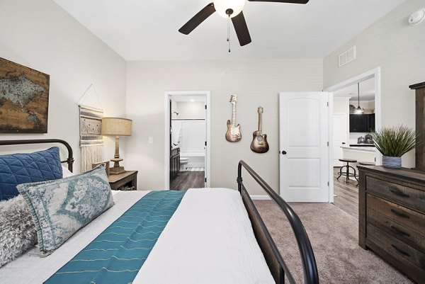 Bedroom with contemporary design and large windows at Easton Place Apartments, luxury apartments by Greystar