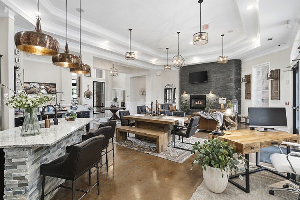 Stylish clubhouse interior at Easton Place Apartments, featuring contemporary seating areas and vibrant decor for luxury living