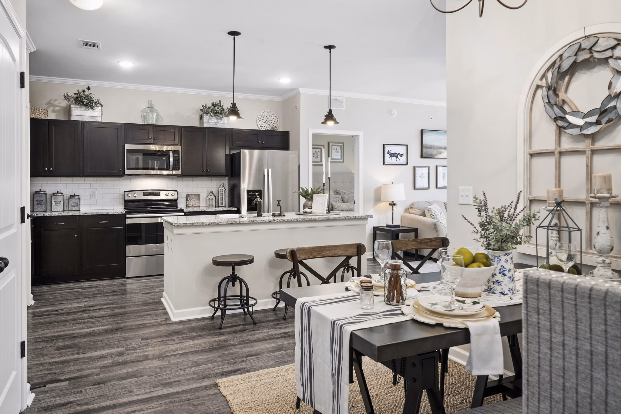 Dining area featuring elegant table settings at Easton Place Apartments with modern luxury design elements