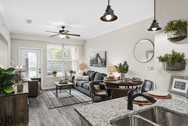 Modern kitchen with stainless steel appliances at Easton Place Apartments