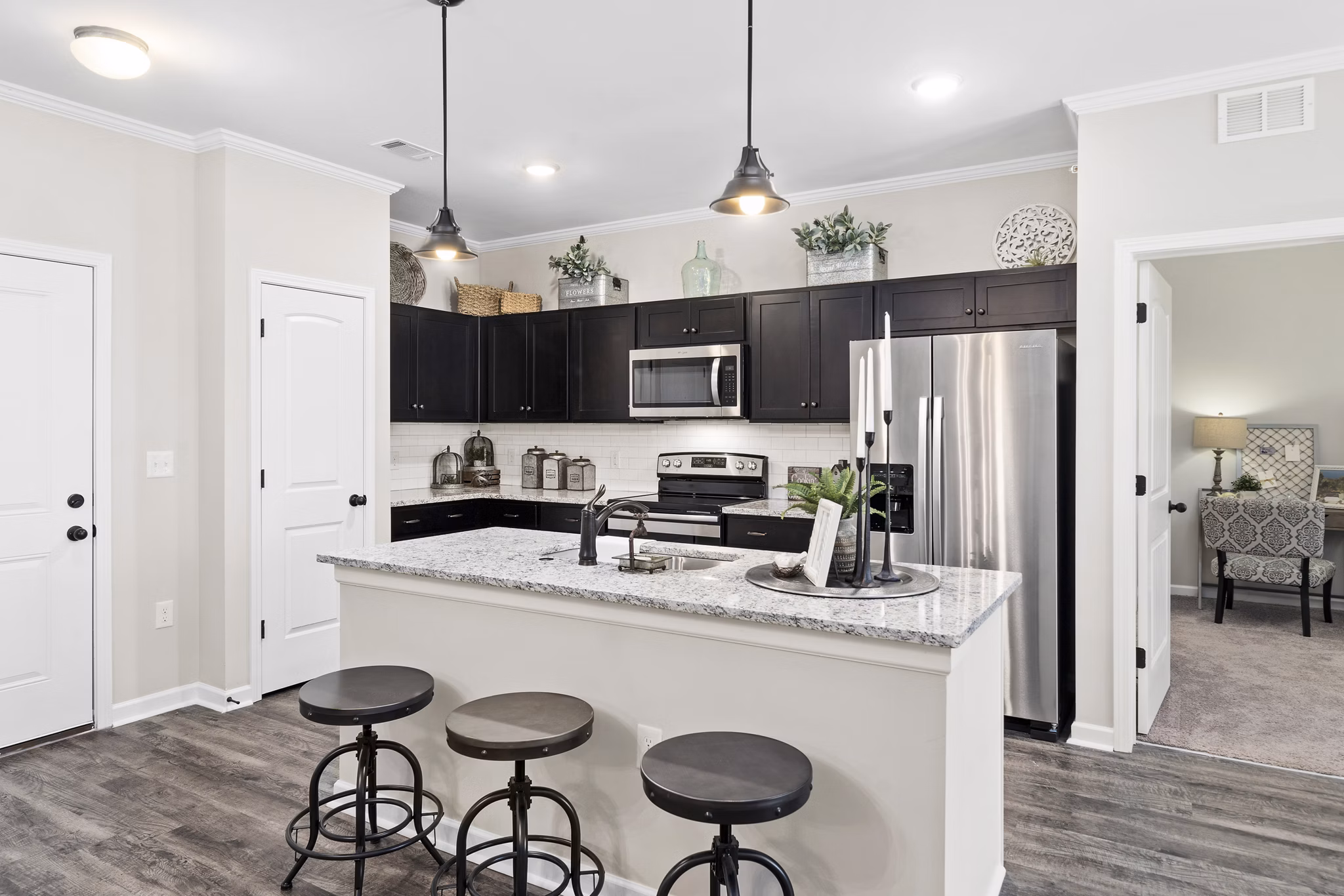 Modern kitchen with stainless steel appliances at Easton Place Apartments