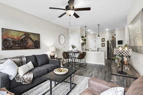 Spacious living room with modern decor in Easton Place Apartments