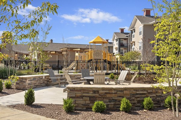 Cozy outdoor fire pit area at Easton Place Apartments offering a relaxing retreat