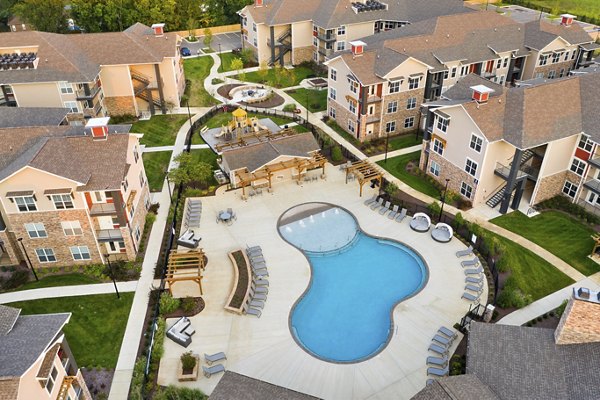Easton Place Apartments: Stunning night view of modern luxury high-rise in downtown location