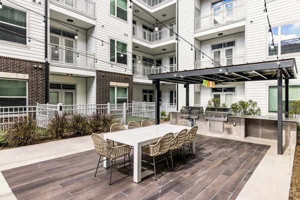 grill area/patio at Harvest Apartments