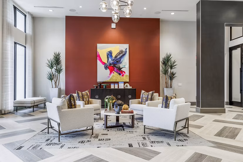 Clubhouse lobby with contemporary design and modern seating at Avelyn San Marcos Apartments