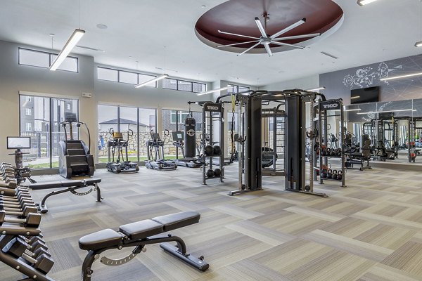 fitness center at Avelyn San Marcos Apartments