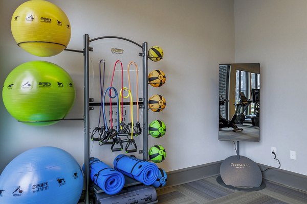 fitness center at Avelyn San Marcos Apartments