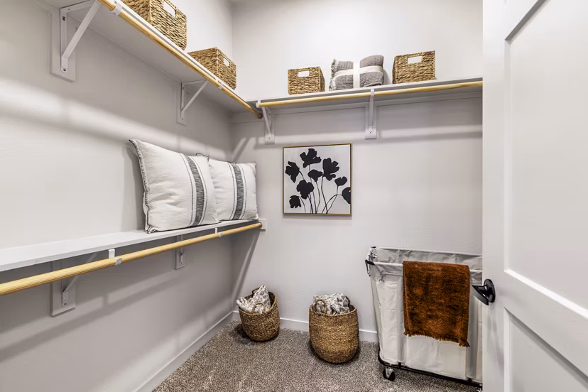 Spacious bedroom closet in Gramercy at Northline Apartments with organized shelving and ample storage space