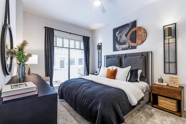 Cozy bedroom with modern decor at Gramercy at Northline Apartments