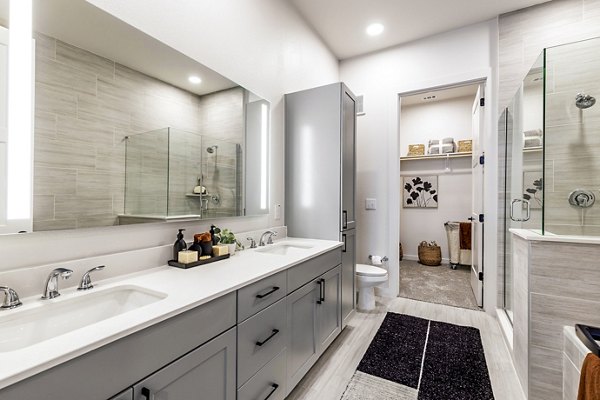 Bathroom with modern fixtures and sleek design at Gramercy at Northline Apartments