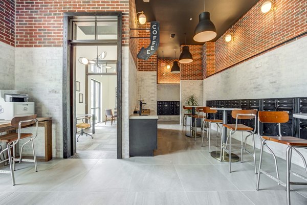 Modern clubhouse with cozy seating at Gramercy at Northline Apartments, perfect for resident gatherings and social events