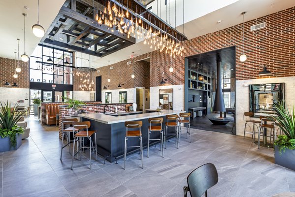 Clubhouse featuring modern decor and seating at Gramercy at Northline Apartments