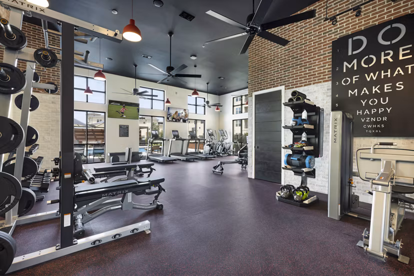 Modern fitness center featuring state-of-the-art equipment at Gramercy at Northline Apartments
