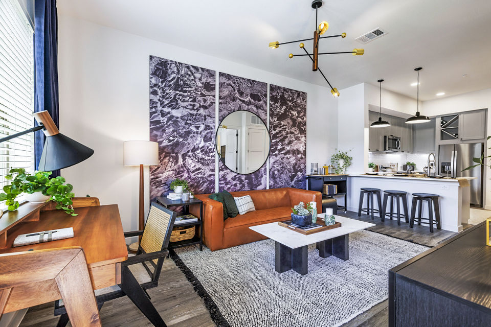 Spacious living room featuring modern decor at Gramercy at Northline Apartments