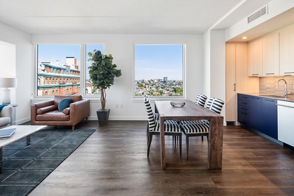 Dining area with elegant decor and modern furnishings at Broadridge Apartments, offering luxury living spaces