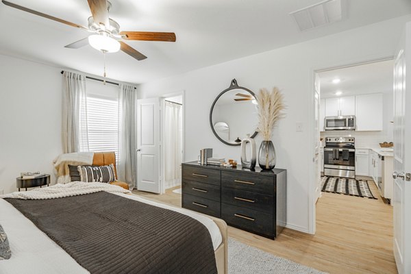 Spacious bedroom with modern decor at Summerwell Wildcat Ranch luxury apartments