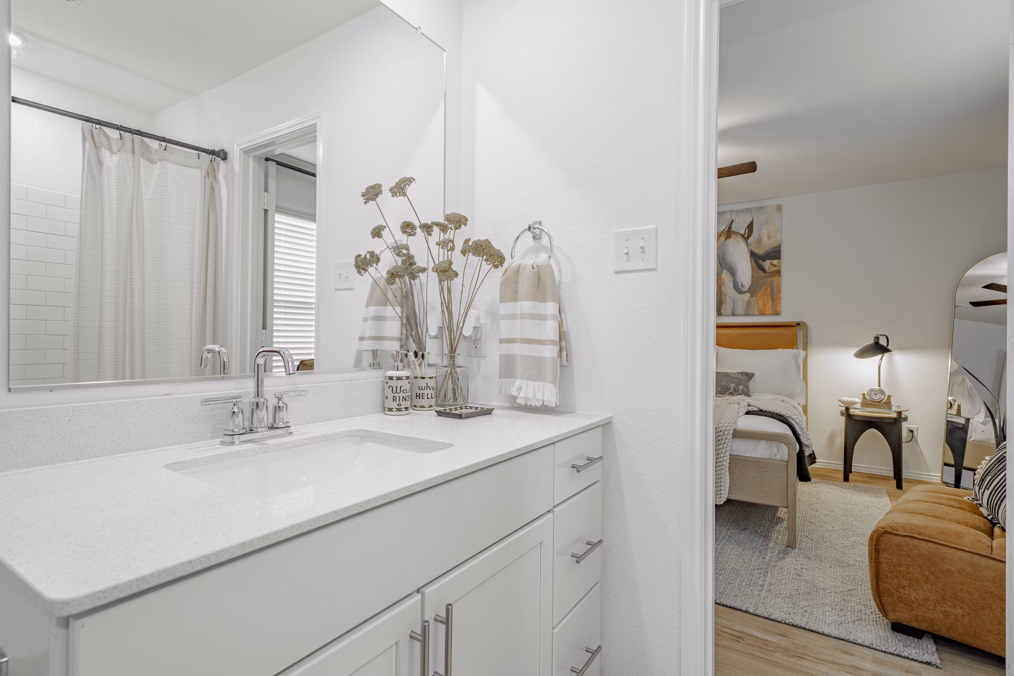 Modern bathroom featuring sleek fixtures at Summerwell Wildcat Ranch Homes Apartments