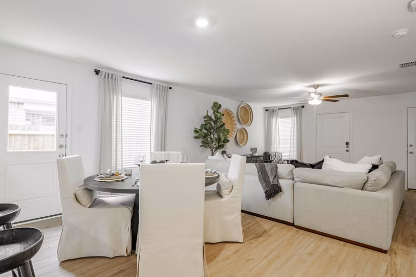 Elegant dining room with modern decor at Summerwell Wildcat Ranch Home Apartments, showcasing luxury living