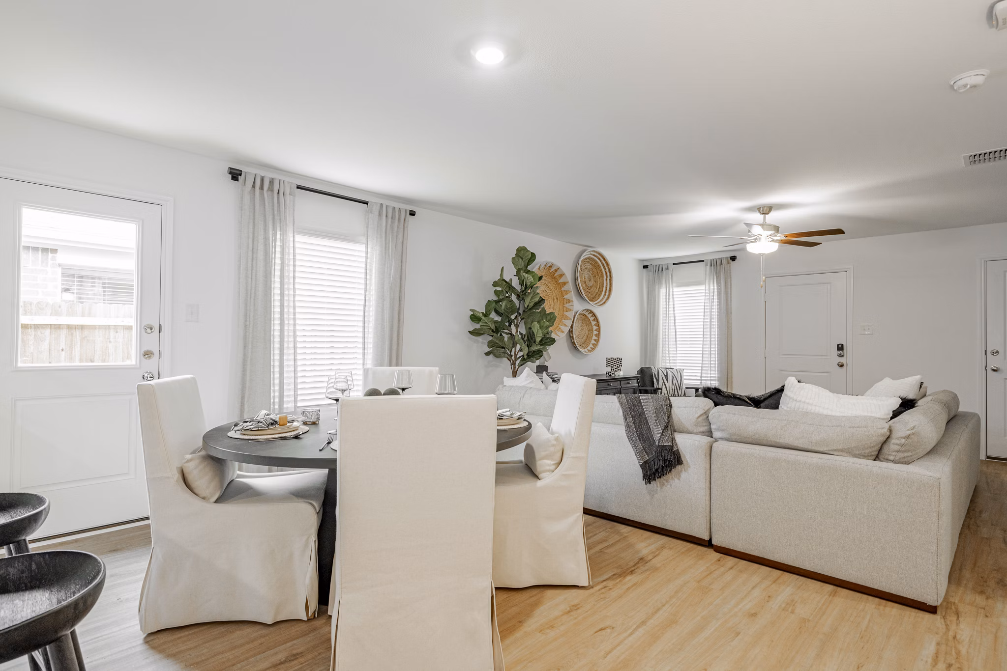 Elegant dining room with modern decor at Summerwell Wildcat Ranch Home Apartments, showcasing luxury living
