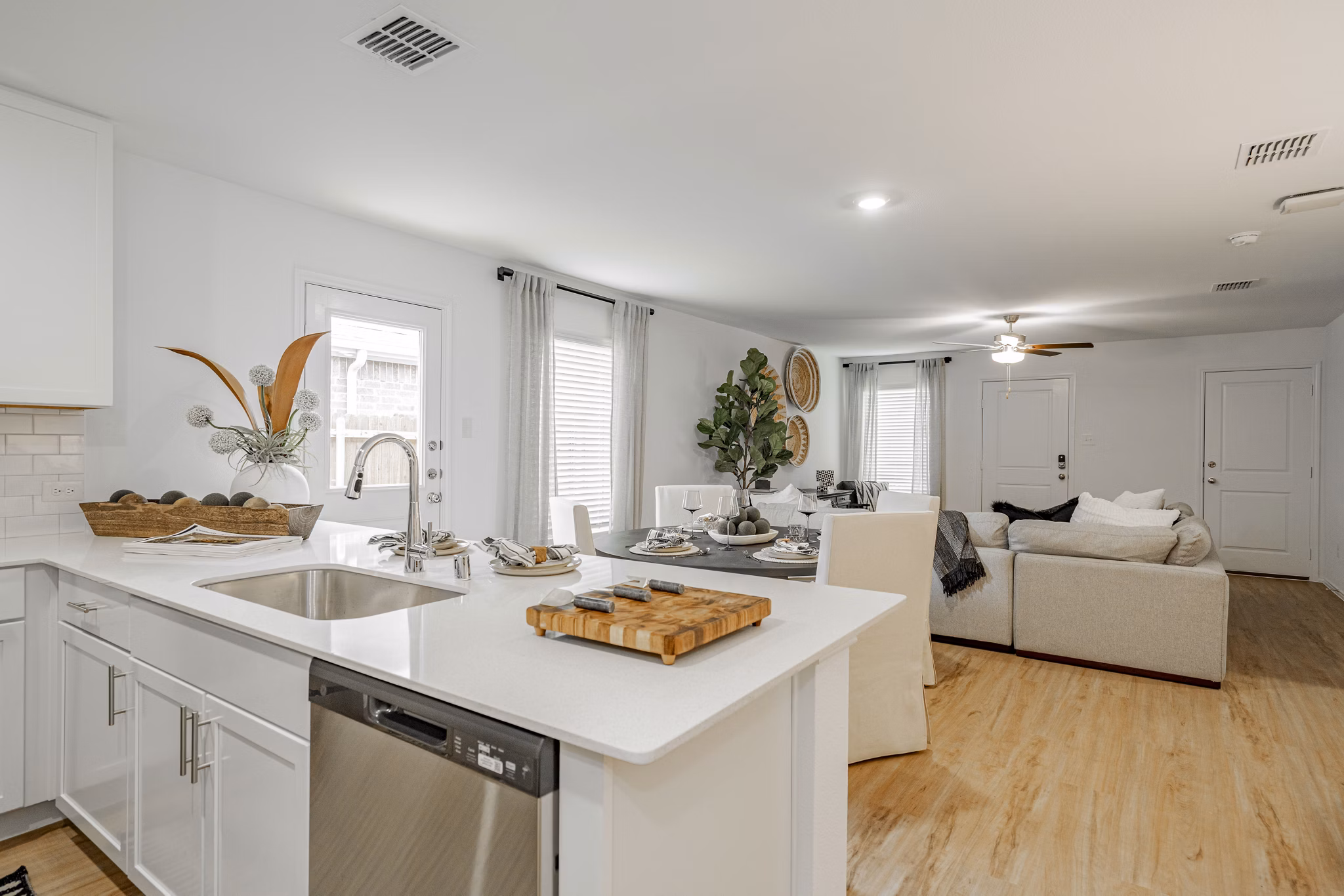 Modern kitchen with stainless steel appliances at Summerwell Wildcat Ranch Home Apartments, offering luxury living