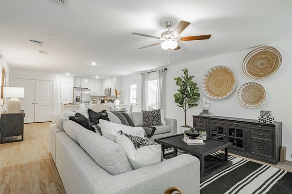 Spacious living room with modern decor at Summerwell Wildcat Ranch luxury apartments