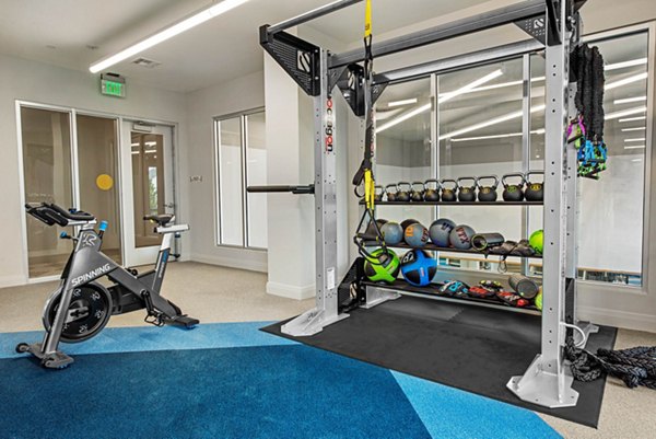 State-of-the-art fitness center with modern equipment at Stadia Med Main Apartments