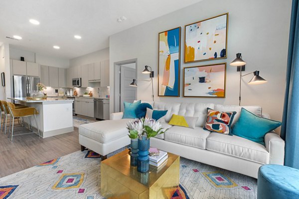 Spacious living room with modern decor at Stadia Med Main Apartments