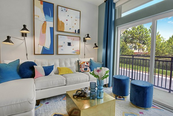 Stylish living room with modern furnishings in Stadia Med Main Apartments