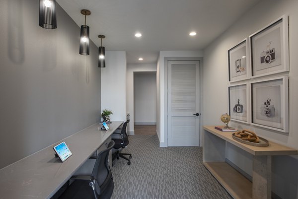 Clubhouse with modern design at Prose KTX Apartments, featuring luxury seating and entertainment spaces for residents