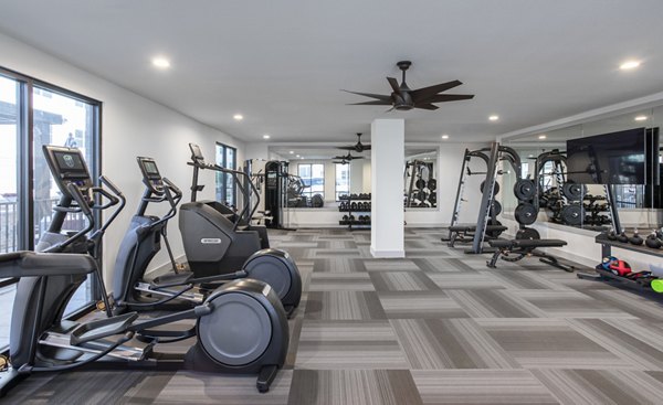 State-of-the-art fitness center with modern equipment at Prose KTX Apartments