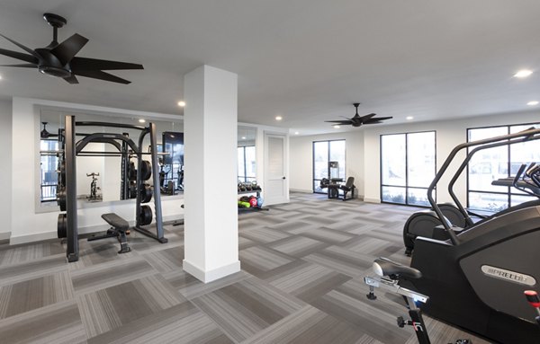 State-of-the-art fitness center with modern exercise equipment at Prose KTX Apartments for wellness-focused living