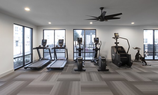 Fitness center with state-of-the-art equipment at Prose KTX Apartments, offering a top-notch workout experience