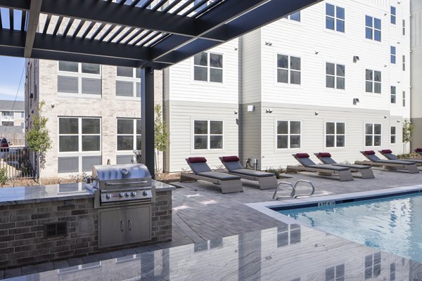 Cozy outdoor patio with stylish seating at Prose KTX Apartments, perfect for relaxation and social gatherings