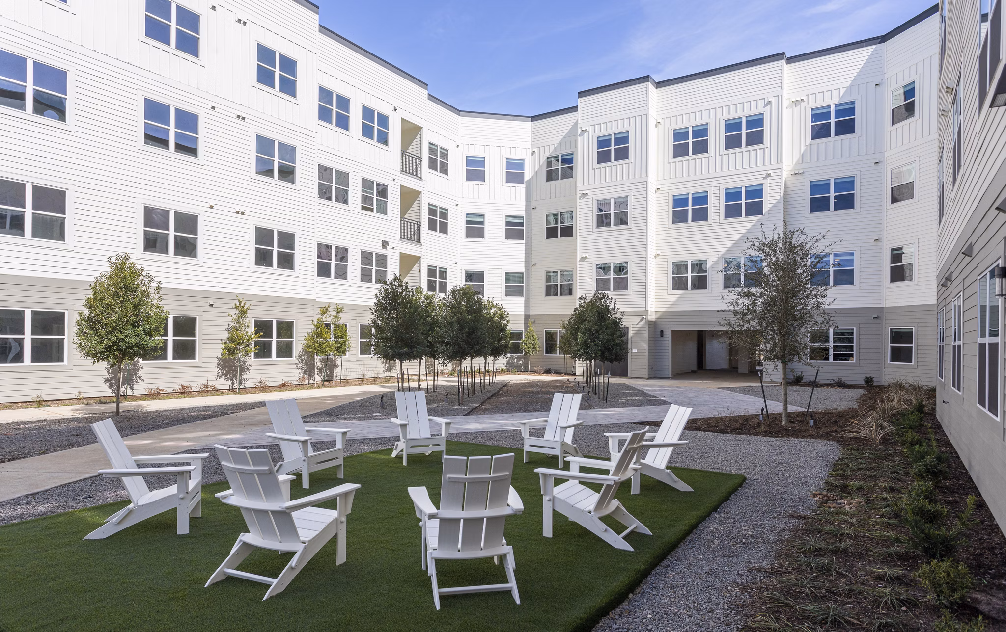 Courtyard with lush landscaping at Prose KTX Apartments luxury complex