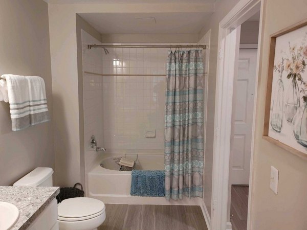 Elegant bathroom design with modern fixtures at Nav850 Apartments