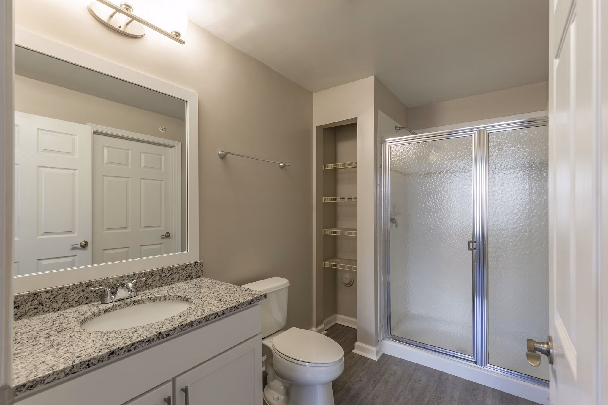 Bathroom with sleek design and modern fixtures at Nav850 Apartments