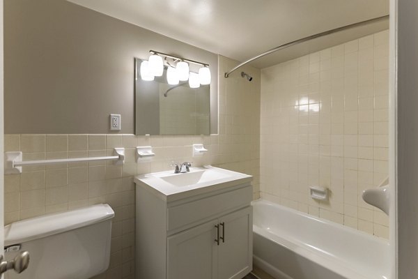 Luxury bathroom with modern fixtures at Nav850 Apartments