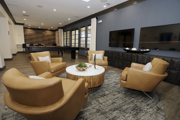 Nav850 Apartments: Modern clubhouse with elegant design and social spaces, perfect for gatherings and relaxation