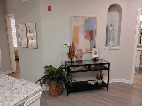 Modern living room with contemporary furniture and large windows at Nav850 Apartments