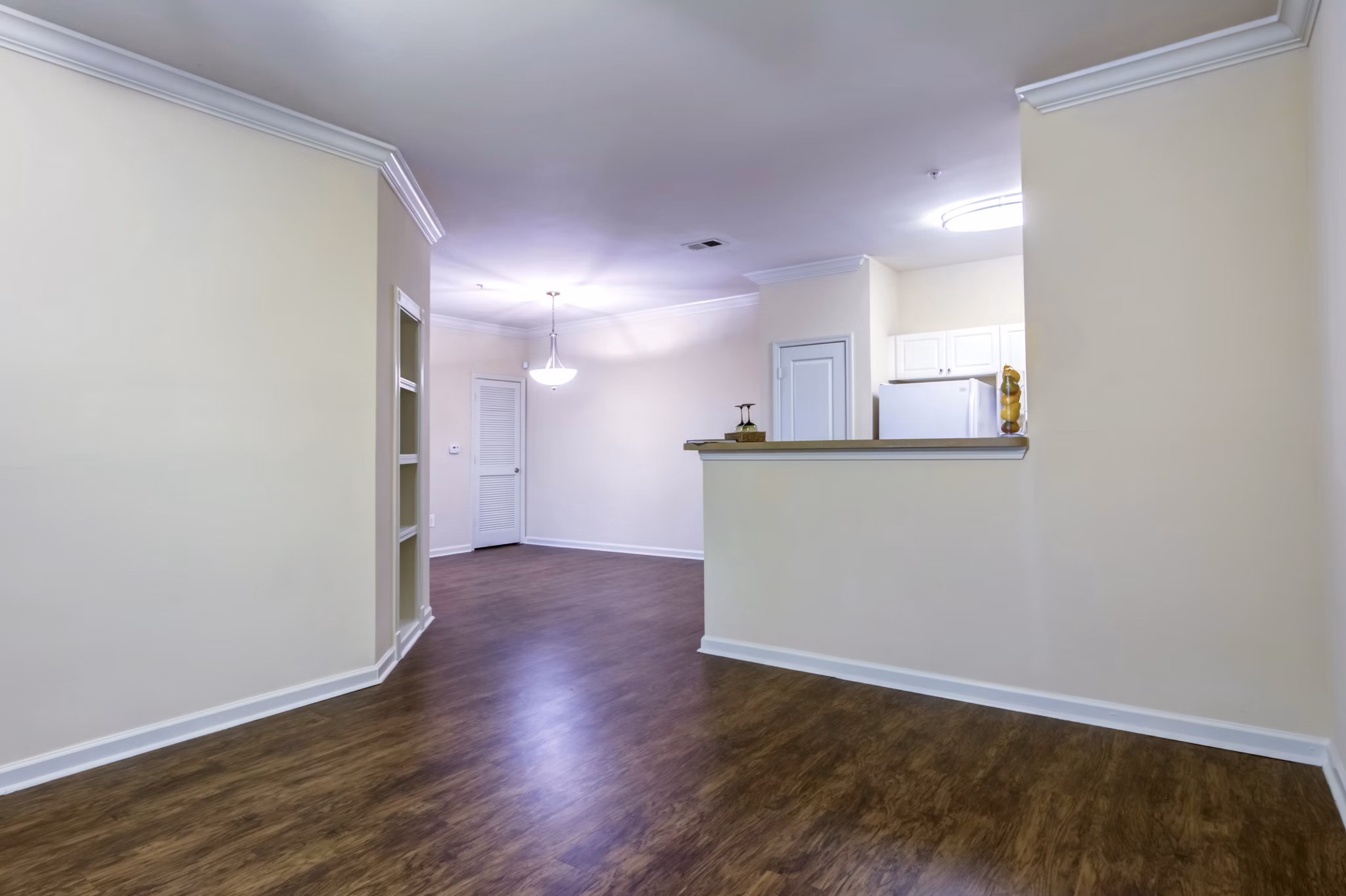 Contemporary kitchen with stainless steel appliances in Aventura Decatur Apartments
