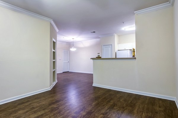 Contemporary kitchen with stainless steel appliances in Aventura Decatur Apartments