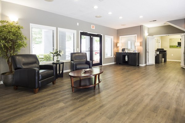 Elegant clubhouse at Aventura Dunwoody Apartments featuring luxurious seating and modern decor for resident gatherings