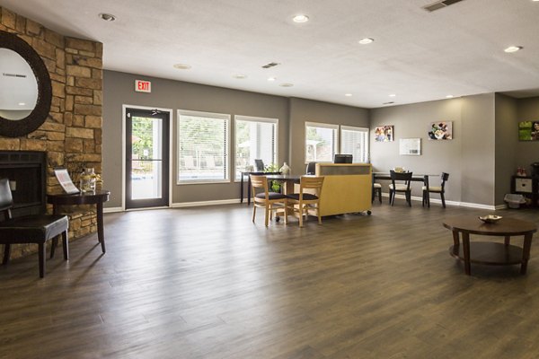 Modern clubhouse at Aventura Dunwoody Apartments featuring elegant lounge areas and high-end decor