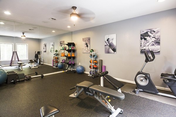 State-of-the-art fitness center at Aventura Dunwoody Apartments with modern equipment and spacious workout areas for all residents