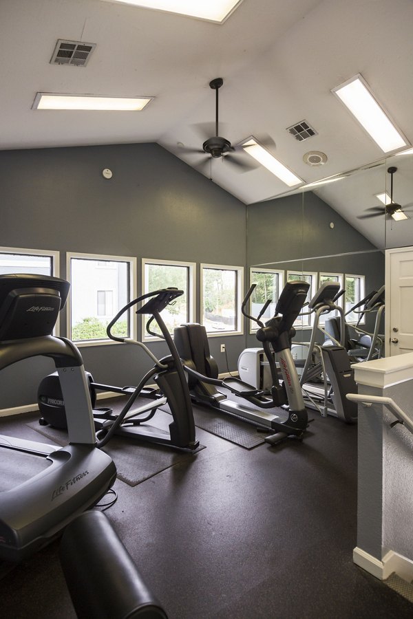 State-of-the-art fitness center with cardio machines at Aventura Dunwoody Apartments
