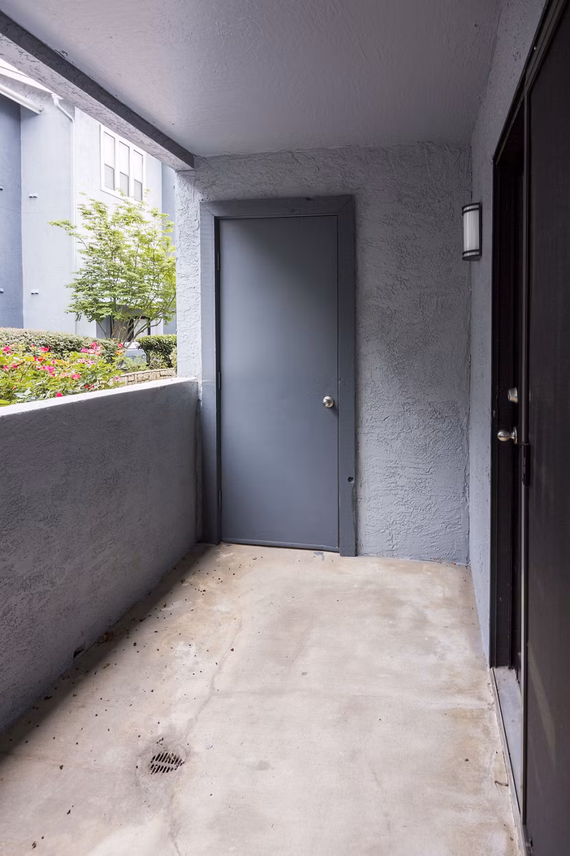 Spacious patio featuring modern outdoor furniture at Aventura Dunwoody Apartments