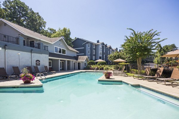 Rooftop pool with city view at Aventura Dunwoody Apartments