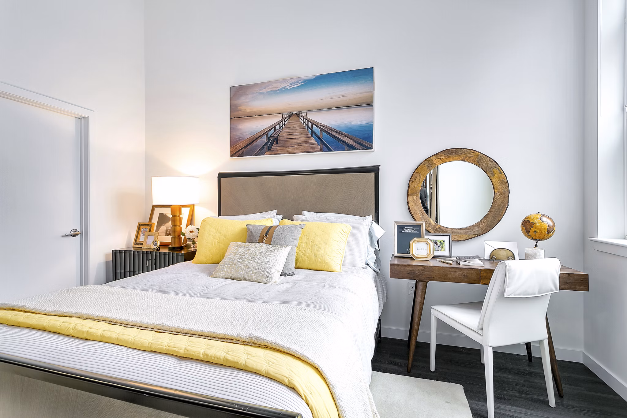Bedroom featuring modern furnishings at Harbor Landing Apartments in Greystar luxury community